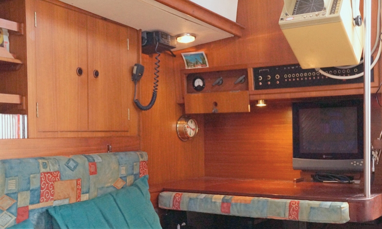 Chart table, adjacent to the companionway, radar rotates towards cockpit