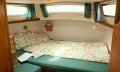 Owner's cabin with comfortable double berth, slatted frame and 8' mattress, private hatch