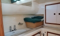 Aft cabin bathroom with ample storage space, full headroom